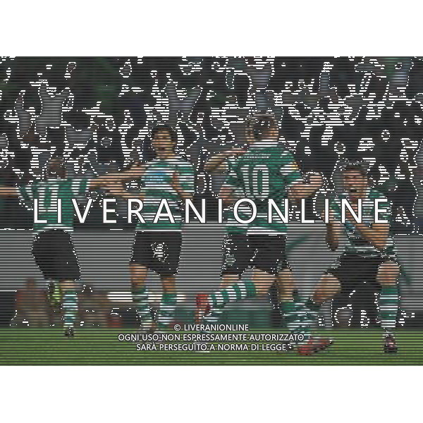 20120329: LISBON, PORTUGAL - Football - UEFA Europe League 2011/2012 - Quarter-finals, First leg: Sporting CP vs Metalist In picture: Sporting\'s Marat Izmailov, from Russia, score the opening goal. PHOTO: Alvaro Isidoro/CITYFILES pilka nozna liga EUROPY EUROPEJSKA sezon 2011/2012 SPORTING LIZBONA vs METALIST CHARKOW CHARKOV FOT. CITYFILES/NEWSPIX.PL PORTUGAL,BRAZIL,SPAIN,GERMANY,FRANCE,UK OUT !!! --- Newspix.pl /ag. Aldo Liverani - ITALY ONLY *** Local Caption *** www.newspix.pl mail us: info@newspix.pl call us: 0048 022 23 22 222 --- Polish Picture Agency by Ringier Axel Springer Poland