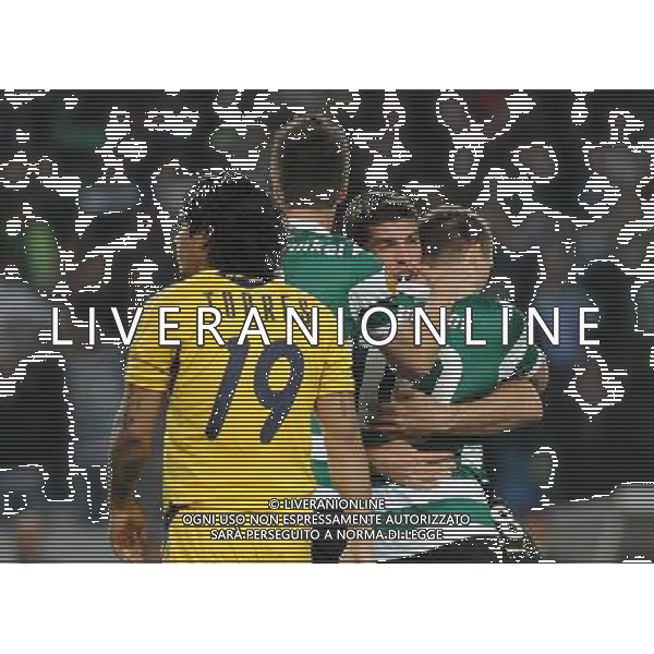 20120329: LISBON, PORTUGAL - Football - UEFA Europe League 2011/2012 - Quarter-finals, First leg: Sporting CP vs Metalist In picture: Sporting\'s Marat Izmailov, from Russia, celebrates with teammate Emiliano Insua, from Argentine, after scoring their opening goal. PHOTO: Alvaro Isidoro/CITYFILES pilka nozna liga EUROPY EUROPEJSKA sezon 2011/2012 SPORTING LIZBONA vs METALIST CHARKOW CHARKOV FOT. CITYFILES/NEWSPIX.PL PORTUGAL,BRAZIL,SPAIN,GERMANY,FRANCE,UK OUT !!! --- Newspix.pl /ag. Aldo Liverani - ITALY ONLY *** Local Caption *** www.newspix.pl mail us: info@newspix.pl call us: 0048 022 23 22 222 --- Polish Picture Agency by Ringier Axel Springer Poland