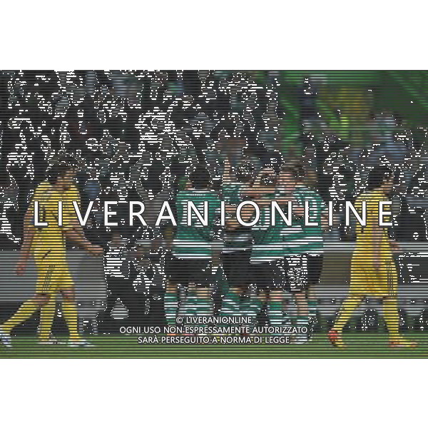 20120329: LISBON, PORTUGAL - Football - UEFA Europe League 2011/2012 - Quarter-finals, First leg: Sporting CP vs Metalist In picture: Sporting\'s Marat Izmailov, from Russia, celebrates with teammates after scoring their opening goal. PHOTO: Alvaro Isidoro/CITYFILES pilka nozna liga EUROPY EUROPEJSKA sezon 2011/2012 SPORTING LIZBONA vs METALIST CHARKOW CHARKOV FOT. CITYFILES/NEWSPIX.PL PORTUGAL,BRAZIL,SPAIN,GERMANY,FRANCE,UK OUT !!! --- Newspix.pl /ag. Aldo Liverani - ITALY ONLY *** Local Caption *** www.newspix.pl mail us: info@newspix.pl call us: 0048 022 23 22 222 --- Polish Picture Agency by Ringier Axel Springer Poland