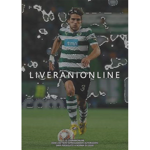 20120329: LISBON, PORTUGAL - Football - UEFA Europe League 2011/2012 - Quarter-finals, First leg: Sporting CP vs Metalist In picture: Sporting\'s Daniel Carrico, controls the ball. PHOTO: Alvaro Isidoro/CITYFILES pilka nozna liga EUROPY EUROPEJSKA sezon 2011/2012 SPORTING LIZBONA vs METALIST CHARKOW CHARKOV FOT. CITYFILES/NEWSPIX.PL PORTUGAL,BRAZIL,SPAIN,GERMANY,FRANCE,UK OUT !!! --- Newspix.pl /ag. Aldo Liverani - ITALY ONLY *** Local Caption *** www.newspix.pl mail us: info@newspix.pl call us: 0048 022 23 22 222 --- Polish Picture Agency by Ringier Axel Springer Poland