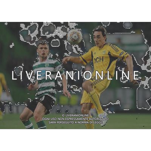 20120329: LISBON, PORTUGAL - Football - UEFA Europe League 2011/2012 - Quarter-finals, First leg: Sporting CP vs Metalist In picture: Sporting\'s Marat Izmailov, from Russia, left, fights for the ball with Metalist\'s Milan Obradovic, from Serbia. PHOTO: Alvaro Isidoro/CITYFILES pilka nozna liga EUROPY EUROPEJSKA sezon 2011/2012 SPORTING LIZBONA vs METALIST CHARKOW CHARKOV FOT. CITYFILES/NEWSPIX.PL PORTUGAL,BRAZIL,SPAIN,GERMANY,FRANCE,UK OUT !!! --- Newspix.pl /ag. Aldo Liverani - ITALY ONLY *** Local Caption *** www.newspix.pl mail us: info@newspix.pl call us: 0048 022 23 22 222 --- Polish Picture Agency by Ringier Axel Springer Poland