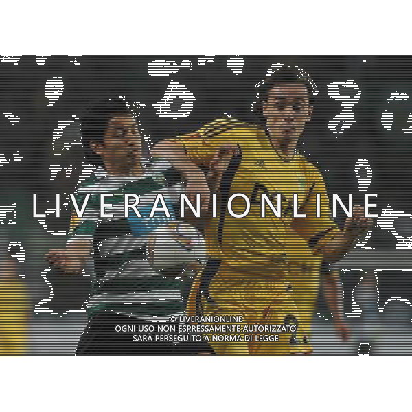 20120329: LISBON, PORTUGAL - Football - UEFA Europe League 2011/2012 - Quarter-finals, First leg: Sporting CP vs Metalist In picture: Sporting\'s Matias Fernandez, from Chile, left, fights for the ball with Metalist\'s Milan Obradovic, from Serbia. PHOTO: Alvaro Isidoro/CITYFILES pilka nozna liga EUROPY EUROPEJSKA sezon 2011/2012 SPORTING LIZBONA vs METALIST CHARKOW CHARKOV FOT. CITYFILES/NEWSPIX.PL PORTUGAL,BRAZIL,SPAIN,GERMANY,FRANCE,UK OUT !!! --- Newspix.pl /ag. Aldo Liverani - ITALY ONLY *** Local Caption *** www.newspix.pl mail us: info@newspix.pl call us: 0048 022 23 22 222 --- Polish Picture Agency by Ringier Axel Springer Poland