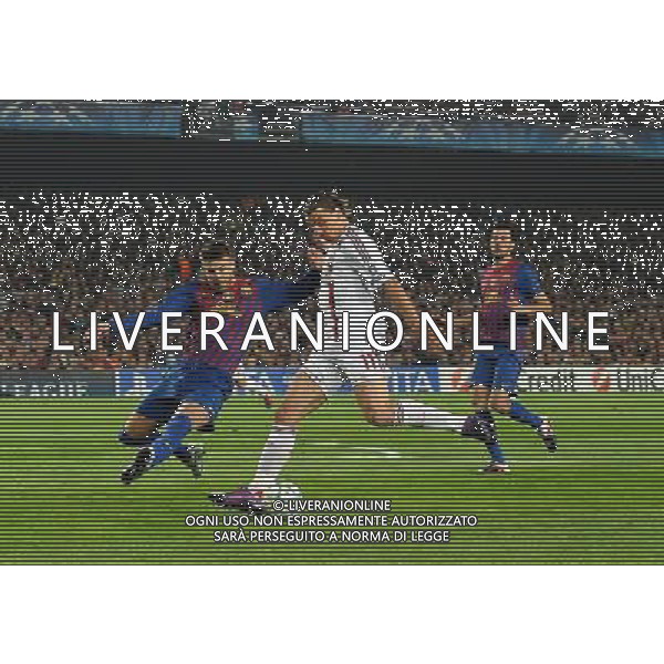 UEFA Champions League 2011/2012 Quarti di Finale Ritorno Barcellona (Spagna) - 03.04.2012 Barcellona-Milan Nella Foto:ibrahimovic fermato da pique\' /Ph.Vitez-Ag. Aldo Liverani