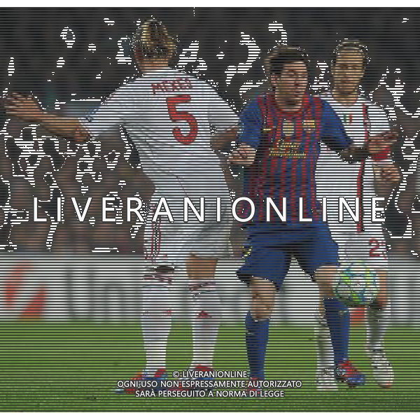 UEFA Champions League 2011/2012 Quarti di Finale Ritorno Barcellona (Spagna) - 03.04.2012 Barcellona-Milan Nella Foto: lionel messi passa fra mexes e ambrosini /Ph.Vitez-Ag. Aldo Liverani