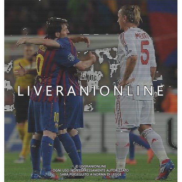 UEFA Champions League 2011/2012 Quarti di Finale Ritorno Barcellona (Spagna) - 03.04.2012 Barcellona-Milan Nella Foto:esultanza finale messi iniesta e delusione mexes /Ph.Vitez-Ag. Aldo Liverani