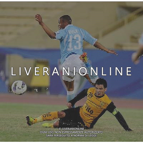 (120404) -- KUWAIT, April 4, 2012 () -- Nawaf al Mutairi (Bottom) of Kuwait\'s Al Qadsia SC vies with Khail Zaid (Up) of Jordan\'s Al Faisaly SC during the AFC Cup 2012 Football match in Kuwait City, Kuwait, on April, 3, 2012. Faisaly won the match 2-1. (/Noufal Ibrahim) ©photoshot/AGENZIA ALDO LIVERANI SAS - ITALY ONLY - EDITORIAL USE ONLY