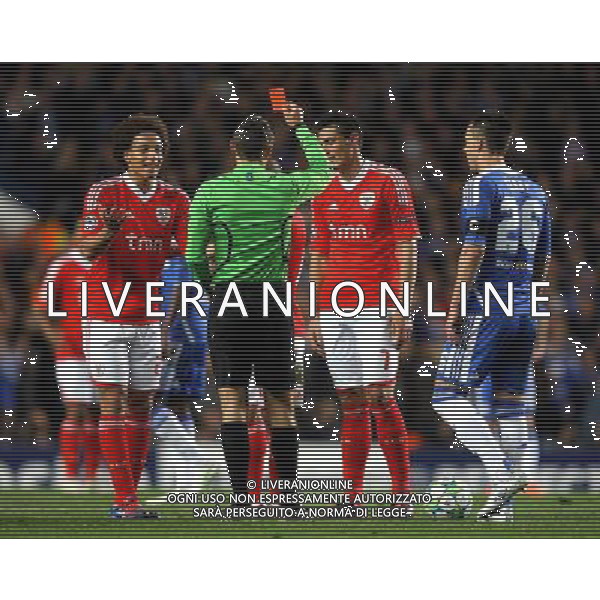 Benfica players remonstrate to the referee as he issues a red card to Benfica\'s Maximiliano Pereira Champions League Quarter Final Second Leg - Chelsea v Benfica - Wednesday 3rd April 2012 - Stamford Bridge - London © CameraSport - 43 Linden Ave. Countesthorpe. Leicester. England. LE8 5PG - Tel: +44 (0) 116 277 4147 - admin@camerasport.com - www.camerasport.com QUARTI DI RITORNO DI CHAMPIONS LEAGUE CHELSEA - BENFICA ALDO LIVERANI SAS ITALY ONLY *** Local Caption *** .