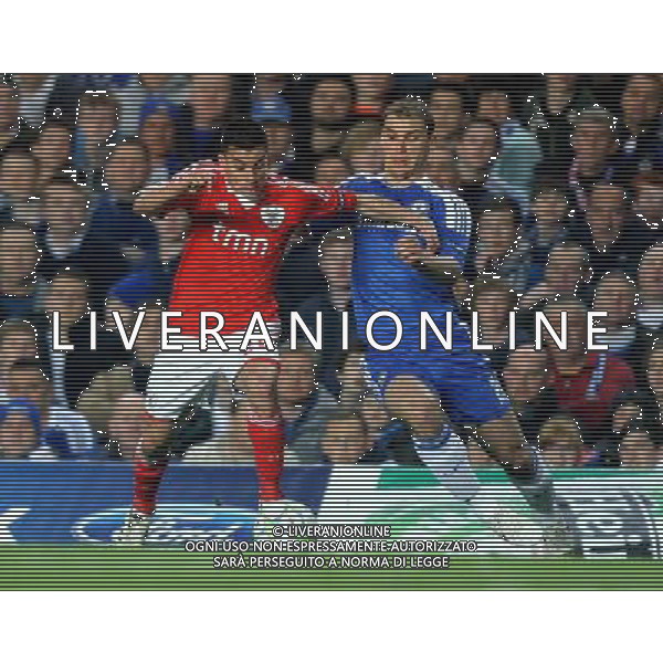Benfica\'s Nicolas Gaitan battles with Chelsea\'s Branislav Ivanovic Champions League Quarter Final Second Leg - Chelsea v Benfica - Wednesday 3rd April 2012 - Stamford Bridge - London © CameraSport - 43 Linden Ave. Countesthorpe. Leicester. England. LE8 5PG - Tel: +44 (0) 116 277 4147 - admin@camerasport.com - www.camerasport.com QUARTI DI RITORNO DI CHAMPIONS LEAGUE CHELSEA - BENFICA ALDO LIVERANI SAS ITALY ONLY *** Local Caption *** .