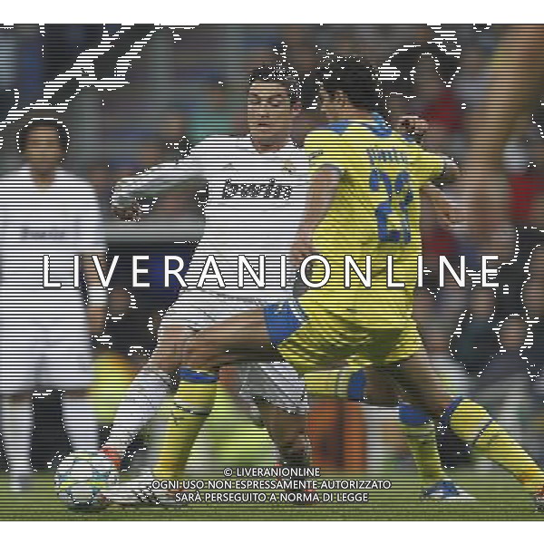 Real Madrid\'s Cristiano Ronaldo and Apoel\'s Helio Pinto during Champions League match on april 4th 2012. Photo: Cesar Cebolla / ALFAQUI /ALDO LIVERANI SAS - ITALY ONLY -