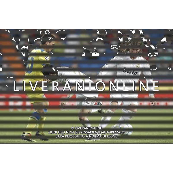 Real Madrid\'s Sergio Ramos and Apoel\'s Constantinos Charalambide during Champions League match on april 4th 2012. Photo: Cesar Cebolla / ALFAQUI /ALDO LIVERANI SAS - ITALY ONLY -