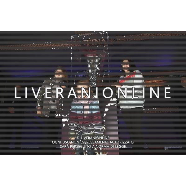 (120412) -- BUCHAREST, April 12, 2012 () -- Three girls pose for pictures with UEFA European League trophy in Bucharest, capital of Romania, April 11, 2012. The famous silverware will visit ten locations until May 9, 2012, when the 2012 UEFA European League final is played in Bucharest. (/Gabriel Petrescu) /PHOTOSHOT/ALDO LIVERANI ITALY ONLY