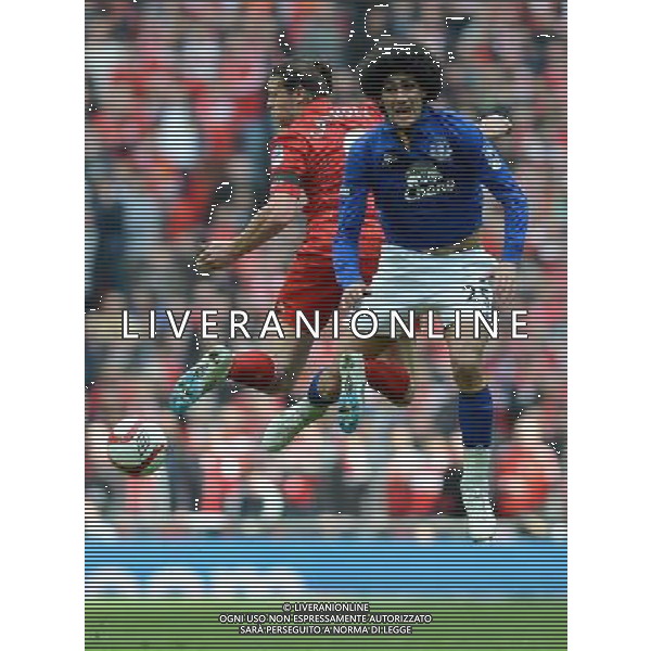 Liverpool\'s Andy Carroll and Everton\'s Marouane Fellaini collide in mid air Football - FA Challenge Cup Semi Final - Liverpool v Everton - Saturday 14th April 2012 - Wembley - London å© CameraSport - 43 Linden Ave. Countesthorpe. Leicester. England. LE8 5PG - Tel: +44 (0) 116 277 4147 - admin@camerasport.com - www.camerasport.com AG ALDO LIVERANI S A S ONLY ITALY
