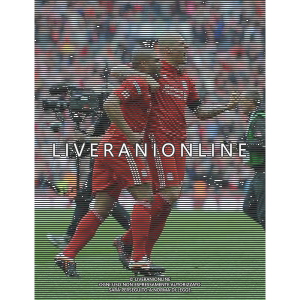 Liverpool\'s Martin Skrtel and Glen Johnson celebrate victory over Everton Football - FA Challenge Cup Semi Final - Liverpool v Everton - Saturday 14th April 2012 - Wembley - London å© CameraSport - 43 Linden Ave. Countesthorpe. Leicester. England. LE8 5PG - Tel: +44 (0) 116 277 4147 - admin@camerasport.com - www.camerasport.com AG ALDO LIVERANI S A S ONLY ITALY