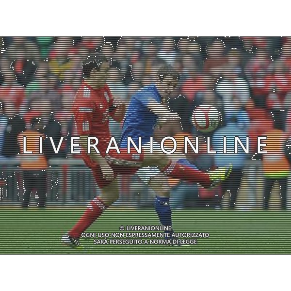 Everton\'s Leighton Baines kicks the ball upfield while under pressure from Liverpool\'s Stewart Downing Football - FA Challenge Cup Semi Final - Liverpool v Everton - Saturday 14th April 2012 - Wembley - London å© CameraSport - 43 Linden Ave. Countesthorpe. Leicester. England. LE8 5PG - Tel: +44 (0) 116 277 4147 - admin@camerasport.com - www.camerasport.com AG ALDO LIVERANI S A S ONLY ITALY