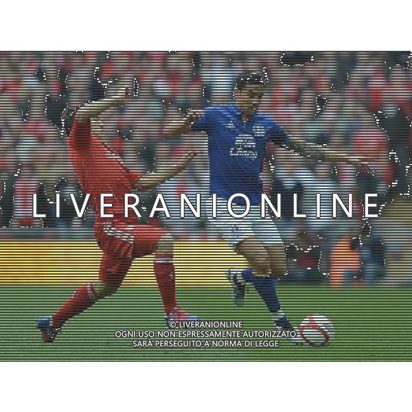 Liverpool\'s Luis Suarez slides in on Everton\'s Tim Cahill Football - FA Challenge Cup Semi Final - Liverpool v Everton - Saturday 14th April 2012 - Wembley - London å© CameraSport - 43 Linden Ave. Countesthorpe. Leicester. England. LE8 5PG - Tel: +44 (0) 116 277 4147 - admin@camerasport.com - www.camerasport.com AG ALDO LIVERANI S A S ONLY ITALY