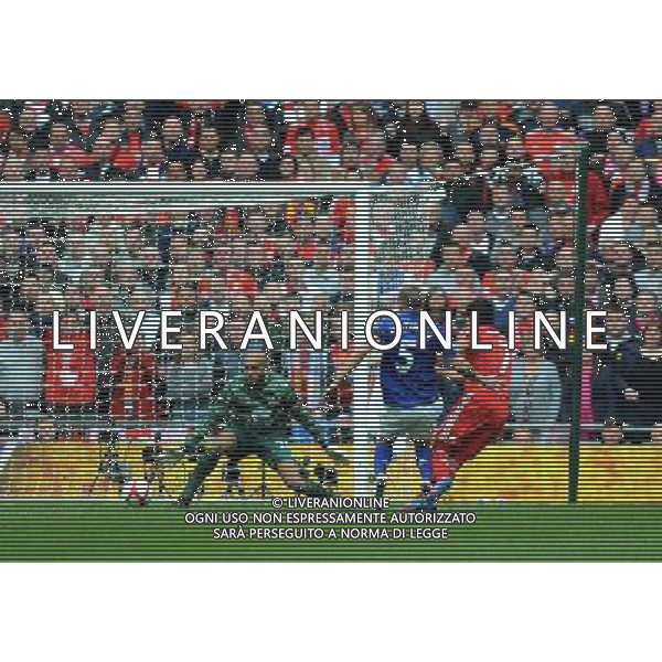 Liverpool\'s Luis Suarez scores his sides first goal Football - FA Challenge Cup Semi Final - Liverpool v Everton - Saturday 14th April 2012 - Wembley - London å© CameraSport - 43 Linden Ave. Countesthorpe. Leicester. England. LE8 5PG - Tel: +44 (0) 116 277 4147 - admin@camerasport.com - www.camerasport.com AG ALDO LIVERANI S A S ONLY ITALY
