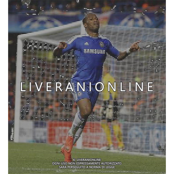 Chelsea\'s Didier Drogba celebrates scoring his sides first goal 1-0 Football - UEFA Champions League Semi-Final First Leg - Chelsea v Barcelona - Wednesday 18th April 2012 - Stamford Bridge - London © CameraSport - 43 Linden Ave. Countesthorpe. Leicester. England. LE8 5PG - Tel: +44 (0) 116 277 4147 - admin@camerasport.com - www.camerasport.com USE EDITORIAL ONLY - AG ALDO LIVERANI SAS - ITALY ONLY -