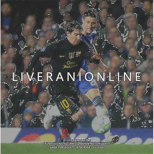Barcelona\'s Lionel Messi battles with Chelsea\'s Gary Cahill Football - UEFA Champions League Semi-Final First Leg - Chelsea v Barcelona - Wednesday 18th April 2012 - Stamford Bridge - London © CameraSport - 43 Linden Ave. Countesthorpe. Leicester. England. LE8 5PG - Tel: +44 (0) 116 277 4147 - admin@camerasport.com - www.camerasport.com USE EDITORIAL ONLY - AG ALDO LIVERANI SAS - ITALY ONLY -