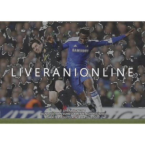 (120419) -- LONDON, April 19, 2012 () -- Lionel Messi (L) of Barcelona vies with John Obi Mikel of Chelsea during the UEFA Champions League Semifinal first leg match between Chelsea FC and FC Barcelona at Stamford Bridge in London, capital of Britain, April 18, 2012. Chelsea won 1-0. (/Wang Lili) - SEMIFINALE DI CHAMPIONS LEAGUE ANDATA CHELSEA BARCELONA ©PHOTOSHOT/AG ALDO LIVERANI SAS - ITALY ONLY -