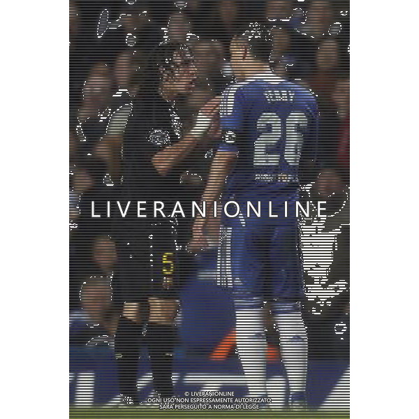 (120419) -- LONDON, April 19, 2012 () -- Carles Puyol (L) of Barcelona argues with John Terry of Chelsea during the UEFA Champions League Semifinal first leg match between Chelsea FC and FC Barcelona at Stamford Bridge in London, capital of Britain, April 18, 2012. Chelsea won 1-0. (/Wang Lili) - SEMIFINALE DI CHAMPIONS LEAGUE ANDATA CHELSEA BARCELONA ©PHOTOSHOT/AG ALDO LIVERANI SAS - ITALY ONLY -
