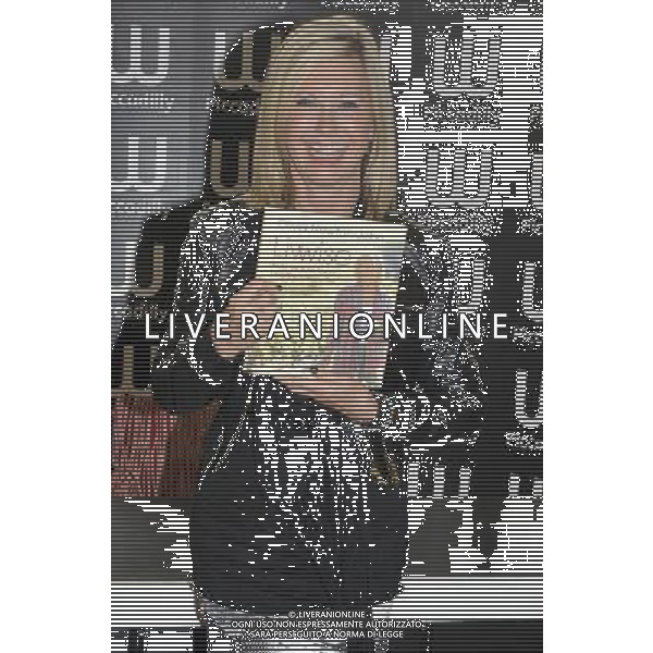Singer \' Actress, Olivia Newton-John at a signing of her new book \'Livwise: Easy Recipes for a Healthy, Happy Life\', which shares over 100 of her favourite recipes, at Waterstones, Piccadilly, London W1 on Thursday 19 April 2012. AG ALDO LIVERANI S A S ONLY ITALY