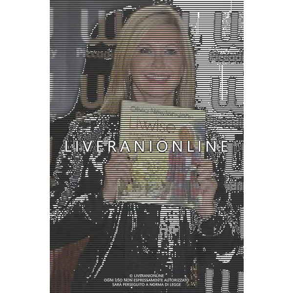 Singer \' Actress, Olivia Newton-John at a signing of her new book \'Livwise: Easy Recipes for a Healthy, Happy Life\', which shares over 100 of her favourite recipes, at Waterstones, Piccadilly, London W1 on Thursday 19 April 2012. AG ALDO LIVERANI S A S ONLY ITALY
