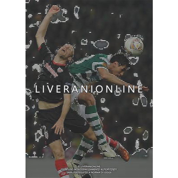 20120419: LISBON, PORTUGAL - Football - UEFA Europe League 2011/2012 - Semi-finals, First leg: Sporting CP vs Athletic Club Bilbao In picture: Xandao (Sporting) and Gaizka Toquero (Athletic Club Bilbao). PHOTO: Alvaro Isidoro/CITYFILES LIGA EUROPY UEFA EUROPEJSKA SEZON 2011/2012 PILKA NOZNA POLFINAL SPORTING LIZBONA vs ATHLETIC BILBAO FOT. CITYFILES/NEWSPIX.PL PORTUGAL,BRAZIL,SPAIN,GERMANY,FRANCE,UK OUT !!! --- Newspix.pl ©AG ALDO LIVERANI SAS - ITALY ONLY - *** Local Caption *** www.newspix.pl mail us: info@newspix.pl call us: 0048 022 23 22 222 --- Polish Picture Agency by Ringier Axel Springer Poland