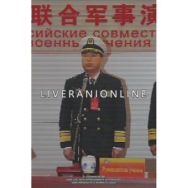 (120422) -- QINGDAO, April 22, 2012 () -- Ding Yiping, deputy commander of the Navy of the Chinese People\'s Liberation Army, delivers exercise tasks of the Russia-China joint naval exercise in Qingdao, east China\'s Shandong Province, April 22, 2012. The Russia-China joint naval exercise, scheduled to be held from April 22 to 27 in the Yellow Sea of the Pacific Ocean, officially started on Sunday morning. (/Zha Chunming) (lfj) ©photoshot/AG ALDO LIVERANI SAS - ITALY ONLY -