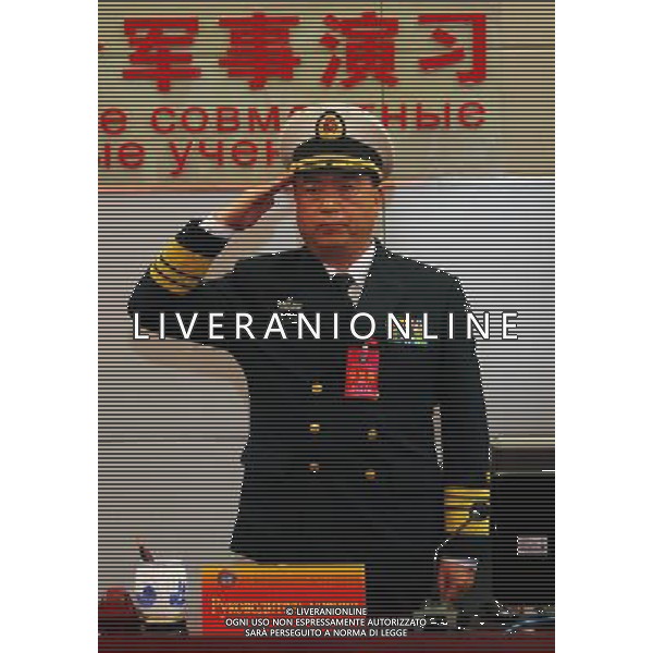 (120422) -- QINGDAO, April 22, 2012 () -- Ding Yiping, deputy commander of the Navy of the Chinese People\'s Liberation Army, attends the starting ceremony of the Russia-China joint naval exercise in Qingdao, east China\'s Shandong Province, April 22, 2012. The Russia-China joint naval exercise, scheduled to be held from April 22 to 27 in the Yellow Sea of the Pacific Ocean, officially started on Sunday morning. The drill involves a total of 16 vessels and two submarines from the Chinese Navy and four warships from the Russian Navy\'s Pacific Fleet as well as three supply ships. The exercise will focus on joint maritime air defense and defense of marine traffic arteries, including subjects of joint escort, maritime search and rescue, anti-submarine tactics as well as joint effort to rescue hijacked vessels. (/Zha Chunming) (lfj) ©photoshot/AG ALDO LIVERANI SAS - ITALY ONLY -