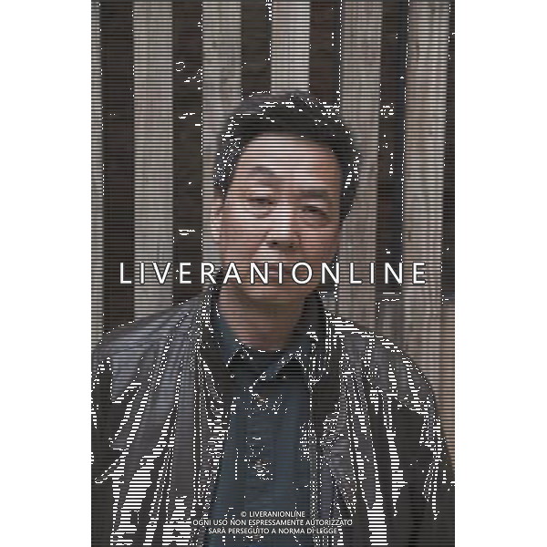 VENICE, ITALY - APRIL 19:Chinese writer Xu Xing poses for a portrait session during \'Incroci di civilta\', Venice Literary Festival on April 19, 2012 in Venice, Italy. VENEZIA FESTIVAL LETTERARIO ©PHOTOSHOT/AG ALDO LIVERANI SAS ITALY ONLY -