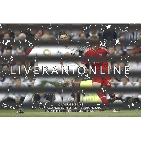 Real Madrid\'s Cristiano Ronaldo and Bayern Munich\'s Philipp Lahm\during Champions League match on april 25th 2012. Photo: Cesar Cebolla / ALFAQUI