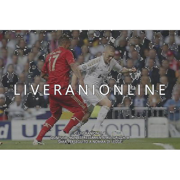 Real Madrid\'s Karim Benzema and Bayern Munich\'s Jerome Boateng during Champions League match on april 25th 2012. Photo: Cesar Cebolla / ALFAQUI