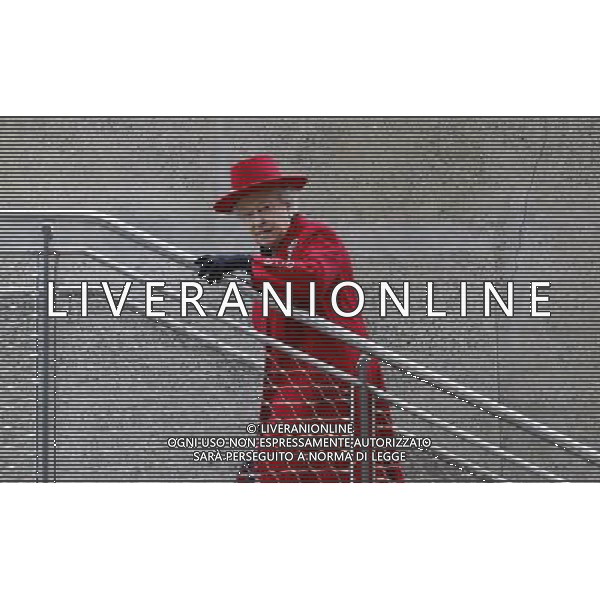 Britain\'s Queen Elizabeth II walks up a set of stairs during a visit to the Cutty Sark in Greenwich, London, Wednesday, April 25, 2012. ©photoshot/AGENZIA ALDO LIVERANI SAS - ITALY ONLY - REALI INGLESI: Sua Maesta\' la Regina Elisabetta II d\'inghilterra in visita al Museo Nazionale della Marina