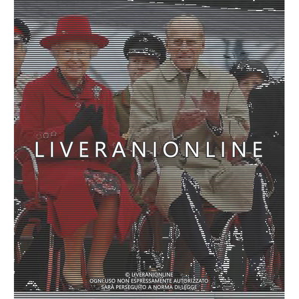 Britain\'s Queen Elizabeth II and Prince Philip watch a presentation during a visit to the Cutty Sark in Greenwich, London, Wednesday, April 25, 2012. The Cutty Sark, built in 1869 was one of the last and one of the fastest tea clippers to be built. The Cutty Sark was badly damaged by fire on in May 2007 but after a 50 million pounds ($80.6 million) restoration project the vessel is restored and will reopen to the public on April 26, 2012 ©photoshot/AGENZIA ALDO LIVERANI SAS - ITALY ONLY - REALI INGLESI: Sua Maesta\' la Regina Elisabetta II d\'inghilterra in visita al Museo Nazionale della Marina