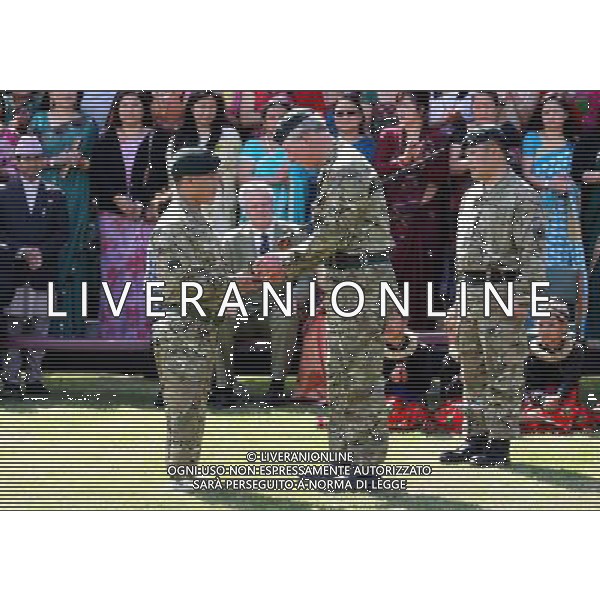 The Prince of Wales, presents a Service medal to Cpl Harri Bahadar Budah who lost both legs whilst serving in Afghanistan, during a visit to The First Battalion The Royal Gurkha Rifles at Sir John Moore Barracks, in Folkestone, Kent. ©photoshot/AGENZIA ALDO LIVERANI SAS - ITALY ONLY - REALI INGLESI: Carlo d\'inghilterra, Principe di Galles, durante una visita al primo battaglione The Rifles Gurkha Reali della caserma Sir John Moore, in Folkestone nel Kent. 