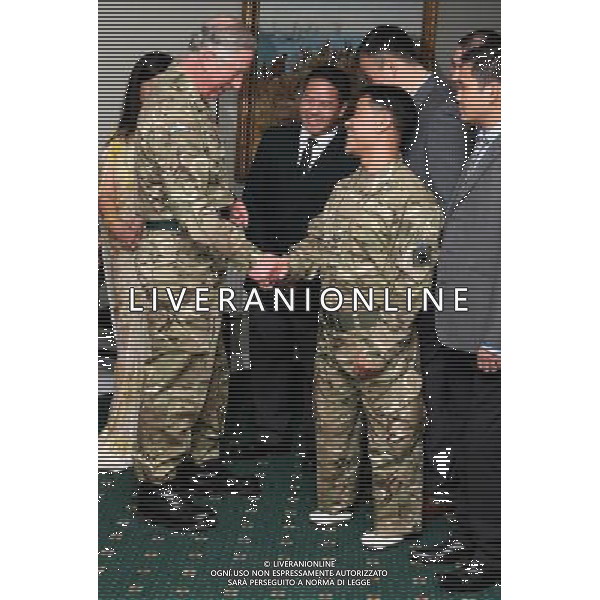 The Prince of Wales meets Corporal Harribahadar Budha, who lost his legs whilst on service in Afghanistan, during a visit to First Battalion The Royal Gurkha Rifles at Sir John Moore Barracks, in Folkestone, Kent. ©photoshot/AGENZIA ALDO LIVERANI SAS - ITALY ONLY - REALI INGLESI: Carlo d\'inghilterra, Principe di Galles, durante una visita al primo battaglione The Rifles Gurkha Reali della caserma Sir John Moore, in Folkestone nel Kent. 