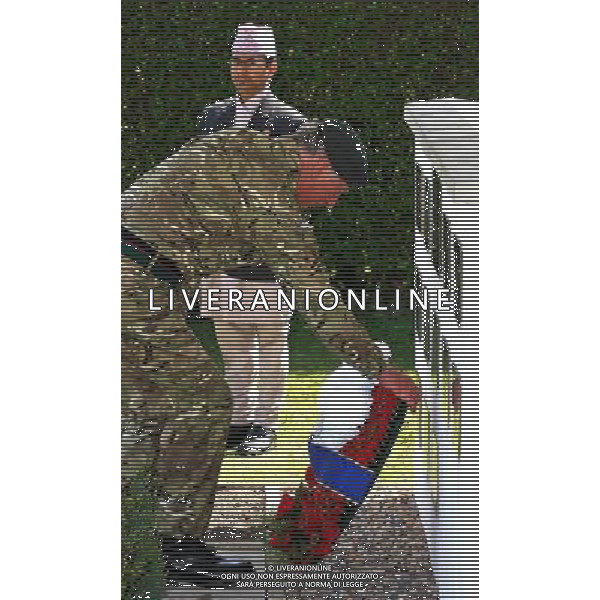The Prince of Wales lays a wreath during a visit to First Battalion The Royal Gurkha Rifles at Sir John Moore Barracks, in Folkestone, Kent. ©photoshot/AGENZIA ALDO LIVERANI SAS - ITALY ONLY - REALI INGLESI: Carlo d\'inghilterra, Principe di Galles, durante una visita al primo battaglione The Rifles Gurkha Reali della caserma Sir John Moore, in Folkestone nel Kent. 