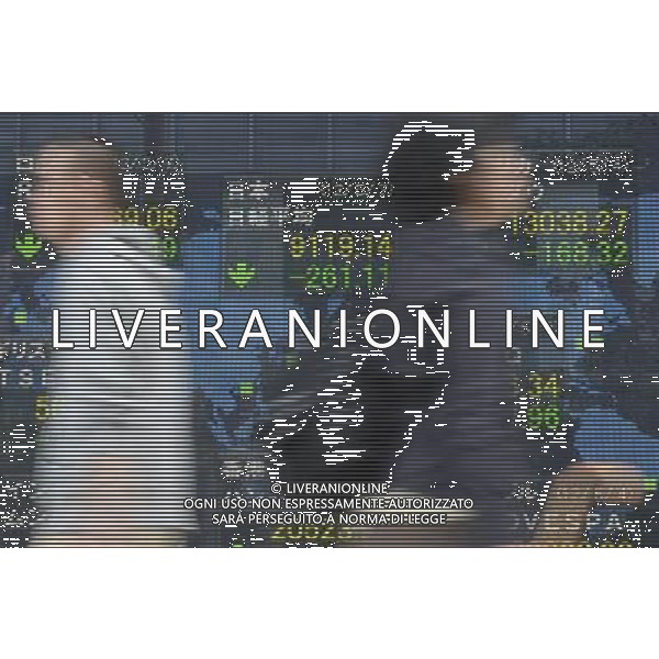 (120507) -- TOKYO, May 7, 2012 () -- People pass by an electronic stock board in Tokyo, Japan, May 7, 2012. Nikkei fell to a three-month closing low below 9,200 on Monday, following fresh European concern raised by French and Greek elections. The 225-issue Nikkei Stock Average ended down 261.11 points, or 2.78 percent, from Wednesday at 9,119.14, its lowest closing mark since Feb. 14, when it fell to 9,052.07. (/Kenichiro Seki) (zw) AG ALDO LIVERANI S A S ONLY ITALY