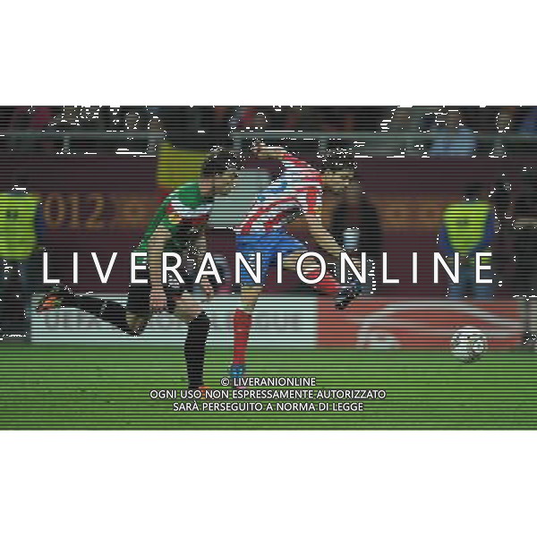 firo Fu§ball,Fussball, 09.05.2012 EL, UEFA Europa League Finale, Finale 2012, Final, Bukarest 2012, Saison 2011/2012 Atletico Madrid - Atletic Bilbao 3:0 Zweikampf, Fernando Amorebieta, Bilbao, Diego, Atletico Madrid, Torschuss, Tor zum 3:0 $worldrightsEs gelten unsere AGB, einsehbar auf www.firosportphoto.de copyright by firo sportphoto: Coesfelder Stra§e 207Ê 48249 D † L M E N (Duelmen) www.firosportphoto.de mail@firosportphoto.de (V o l k s b a n k B o c h u m - W i t t e n ) BLZ.: 430 601 29 Kt. Nr.: 341 117 100 Tel:Ê 02594-9916004 Fax:Ê 02594-9916005 BUCAREST_FINALE EUROPA LEGUE Atletico Madrid-Athletic Bilbao AG ALDO LIVERANI SAS - ITALY ONLY -
