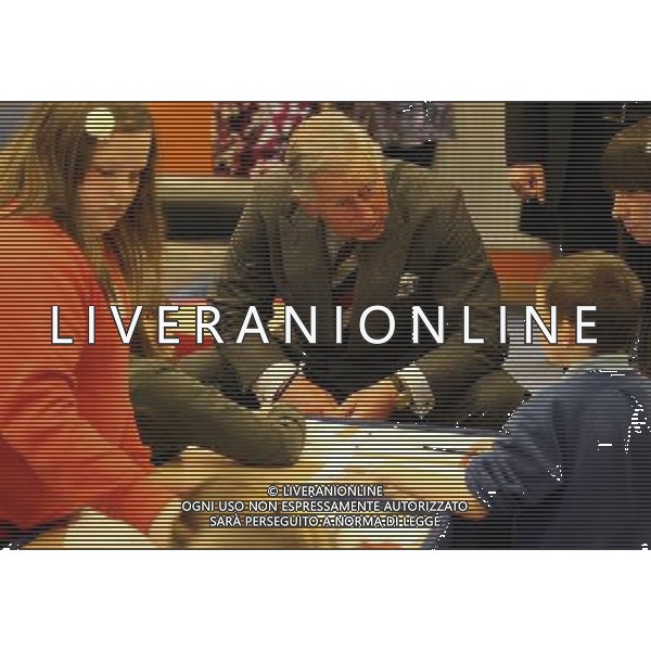 The Duke of Rothesay crouches to speak to children during a visit to the North West Youth Project in Kilmarnock. ©photoshot/AGENZIA ALDO LIVERANI SAS - ITALY ONLY - REALI INGLESI: Il principoe Carlo d\'inghilterra in visita ai giovani del Nord Ovest Progetto a Kilmarnock. Scozia