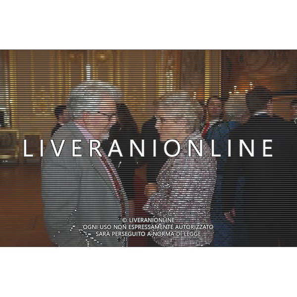 Rolf Harris and Angela Rippon speak during a tea party hosted by Queen Elizabeth II for the cast of the Diamond Jubilee Pageant at Windsor Castle, Berkshire. ©photoshot/AGENZIA ALDO LIVERANI SAS - ITALY ONLY - REALI INGLESI: La Regina Elisabetta II d\'inghiletrra durante un ricevimento per il giubileo di diamante al Castello di Windsor, Berkshire. Londra