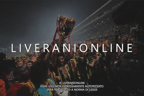 Ziraat Turkish Cup Final Match between Bursaspor and Fenerbahce at 19 mayis Stadium in Ankara on may 16, 2012. Scored: Bursaspor 0 - Fenerbahce 4 Pictured: Fenerbahce players ( Mehmet Topuz )celebrate with the trophy after the match. PUCHAR TURCJI LIGA TURECKA FINAL SEZON 2011/2012 PILKA NOZNA FOT.SESKIM PHOTO/NEWSPIX.PL TURKEY, GERMANY, AUSTRIA AND UK OUT !!! --- Newspix.pl /AGF ALDO LIVERANI SAS - ITALY ONLY - *** Local Caption *** .