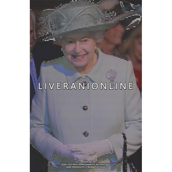 BURNLEY, ENGLAND - MAY 16: Queen Elizabeth II smiles as she visits Slaters Terrace Wharf, Burnley, as part of her Diamond Jubilee tour of the country on May 16, 2012 in Burnley, England. The Queen is visiting many parts of Britain as she celebrates her Diamond Jubilee culminating with a four-day public holiday on June 2-5, including a pageant of 1,000 boats on the River Thames. /ALDO LIVERANI SAS-ITALY ONLY - EDITORIAL USE ONLY