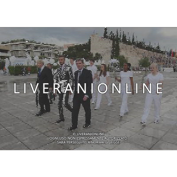 (left to right) Boris Johnson, David Beckham and Hugh Robertson during the official handover ceremony of the olympic flame at the Panathenaic Stadium, home of the 1896 Athens Games. The flame will be transferred to Lands End where three-time Olympic sailing champion Ben Ainslie will be the first torchbearer in the final 70-day relay to the start of the Games. /ALDO LIVERANI SAS-ITALY ONLY - EDITORIAL USE ONLY