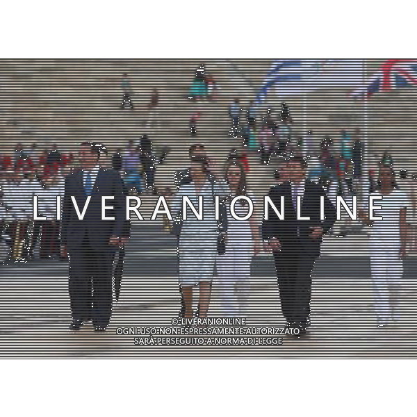 The Princess Royal waves during the official handover ceremony of the olympic flame at the Panathenaic Stadium, home of the 1896 Athens Games. The flame will be transferred to Lands End where three-time Olympic sailing champion Ben Ainslie will be the first torchbearer in the final 70-day relay to the start of the Games. /ALDO LIVERANI SAS-ITALY ONLY - EDITORIAL USE ONLY