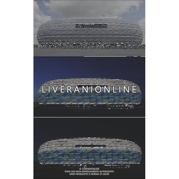 (120518) -- MUNICH, May 18, 2012 () -- Combo photo taken on May 17, 2012 shows an outer view of Allianz Arena in the morning (Top), at nightfall (C) and at night. Allianz Arena is illuminated with the colours of the UEFA Champions League. FC Bayern Munich and FC Chelsea will play in the UEFA Champions League final match on May 19, 2012, at Allianz Arena in Munich, Germany. (/Wang Lili) ©photoshot/AGENZIA ALDO LIVERANI SAS - ITALY ONLY - Preparativi per la finale di Champions League durante il Festival Champions al Olympic Park a Monaco di Baviera, in Germania, 17 maggio 2012 .