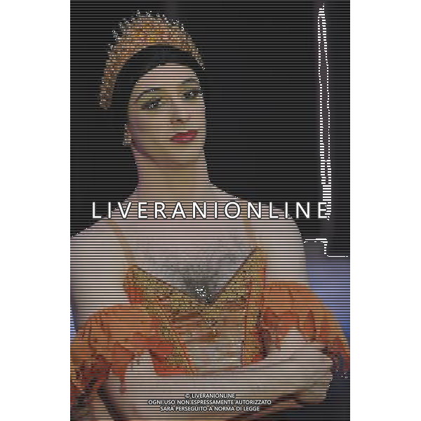 (120515) -- HONG KONG, May 15, 2012 () -- A dancer of Les Ballets Trockadero de Monte Carlo has a break during a rehearsal for a show in Hong Kong, south China, May 15, 2012. Les Ballets Trockadero de Monte Carlo, an American all-male drag ballet corps, gave its first show in Hong Kong on Tuesday. The 14 dancers of the ballet group portray both male and female roles in a humorous style. Their shows will last until May 20 in Hong Kong. (/Zhao Yusi) (llp) /ALDO LIVERANI SAS-ITALY ONLY - EDITORIAL USE ONLY