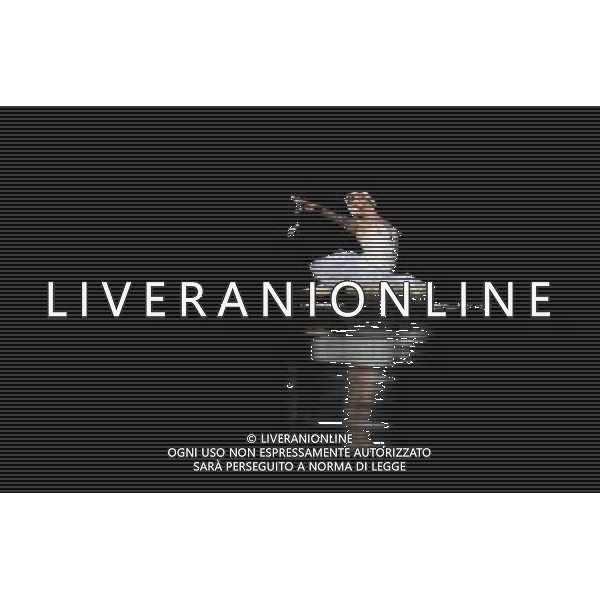 (120515) -- HONG KONG, May 15, 2012 () -- A dancer of Les Ballets Trockadero de Monte Carlo rehearses an excerpt of ballet Swan Lake in Hong Kong, south China, May 15, 2012. Les Ballets Trockadero de Monte Carlo, an American all-male drag ballet corps, gave its first show in Hong Kong on Tuesday. The 14 dancers of the ballet group portray both male and female roles in a humorous style. Their shows will last until May 20 in Hong Kong. (/Zhao Yusi) (llp) /ALDO LIVERANI SAS-ITALY ONLY - EDITORIAL USE ONLY