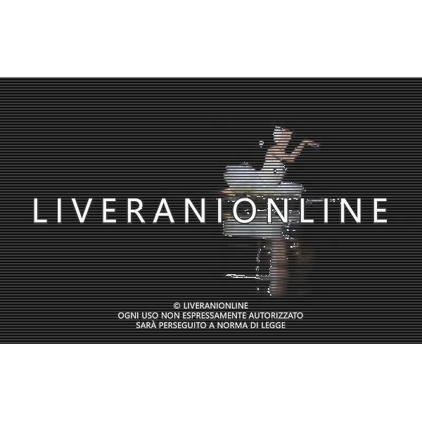 (120515) -- HONG KONG, May 15, 2012 () -- A dancer of Les Ballets Trockadero de Monte Carlo performs an excerpt of ballet Swan Lake in Hong Kong, south China, May 15, 2012. Les Ballets Trockadero de Monte Carlo, an American all-male drag ballet corps, gave its first show in Hong Kong on Tuesday. The 14 dancers of the ballet group portray both male and female roles in a humorous style. Their shows will last until May 20 in Hong Kong. (/Zhao Yusi) (llp) /ALDO LIVERANI SAS-ITALY ONLY - EDITORIAL USE ONLY