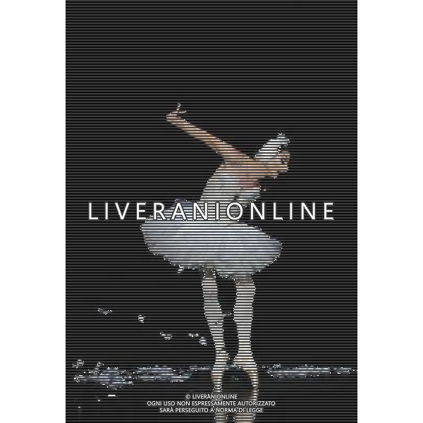 (120515) -- HONG KONG, May 15, 2012 () -- A dancer of Les Ballets Trockadero de Monte Carlo performs an excerpt of ballet Swan Lake in Hong Kong, south China, May 15, 2012. Les Ballets Trockadero de Monte Carlo, an American all-male drag ballet corps, gave its first show in Hong Kong on Tuesday. The 14 dancers of the ballet group portray both male and female roles in a humorous style. Their shows will last until May 20 in Hong Kong. (/Zhao Yusi) (llp) /ALDO LIVERANI SAS-ITALY ONLY - EDITORIAL USE ONLY